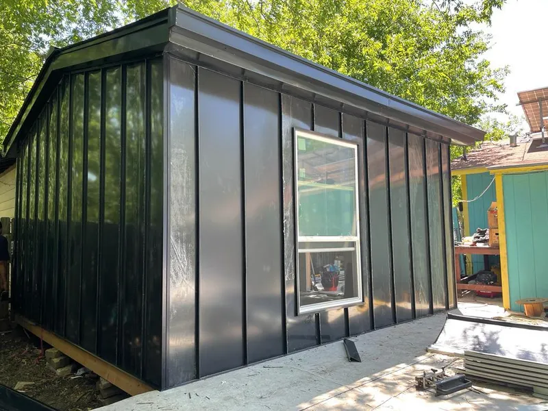 Black standing seam metal wall panels for Metal Roof Installation in Wells