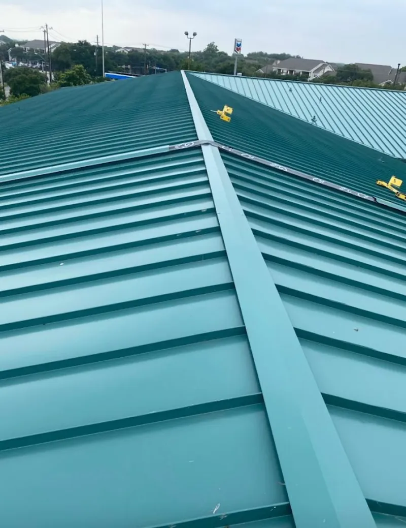 Green commercial metal roof ridge and valley for Metal Roof Repair in Wells